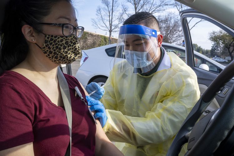 person receiving COVID-19 vaccine