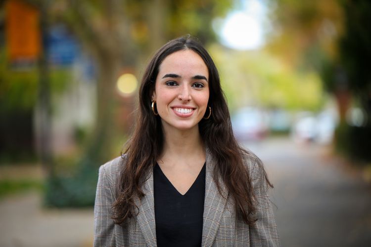 A law student poses for a photo.