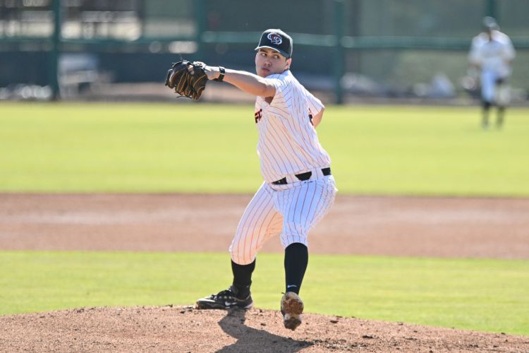 Jakob Guardado '25 pitching for the Tigers.