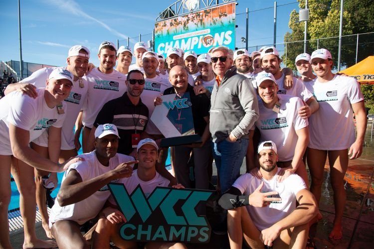 the team poses for a group picture after the game