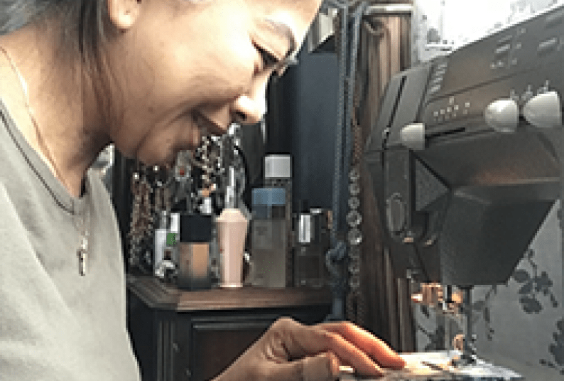 Volunteer making mask