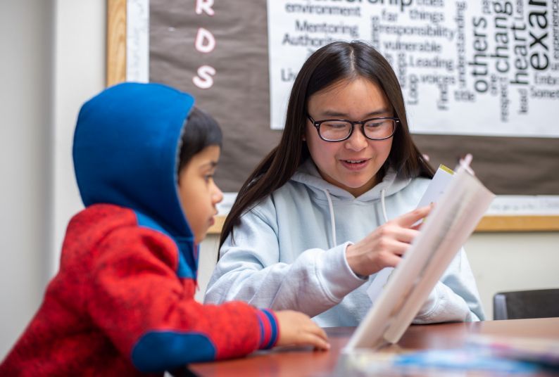 Child being read book