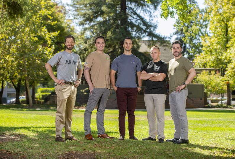 From left, former military veterans and McGeorge School of Law alumni Alex Haggard, ’21 (Army); Josh Hudnall, ‘20 (Navy); Michael LaRocque, ‘20 (Army); Matt Buelow, ’21 (Marines); and Thomas Humann, ‘20 (Marines) pose for a Military Law Society photo in October 2019.