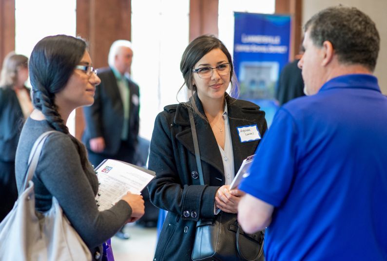 Photo of students at a career fair. 