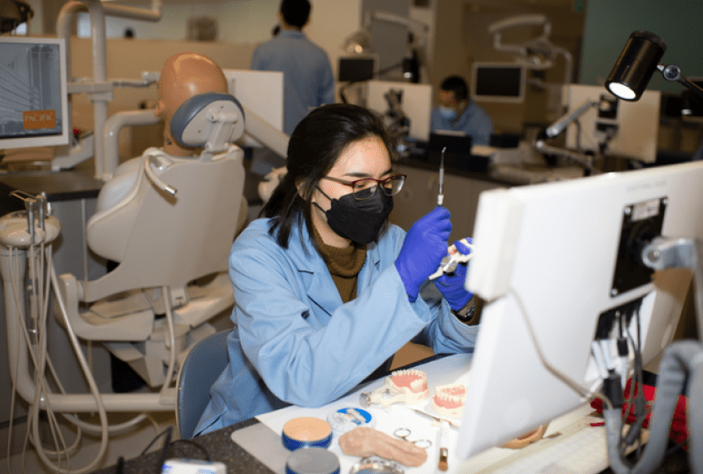 A student works in the simulation clinic