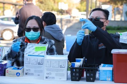 Pacific students volunteer at a COVID-19 vaccine clinic. 