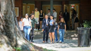 group of students walking on campus