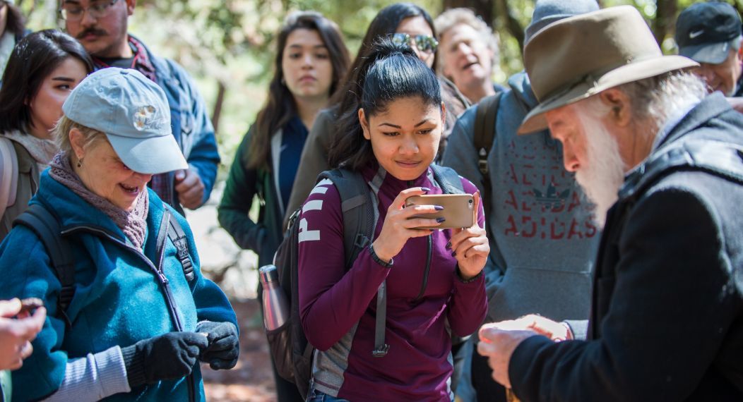 History student listens to John Muir impersonator