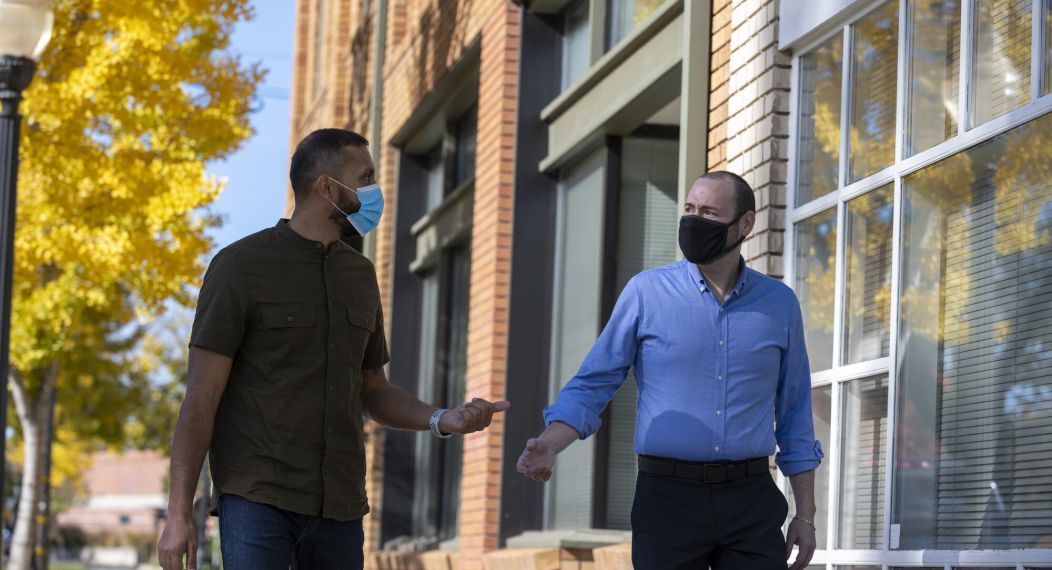 students walking in front of Muddox building